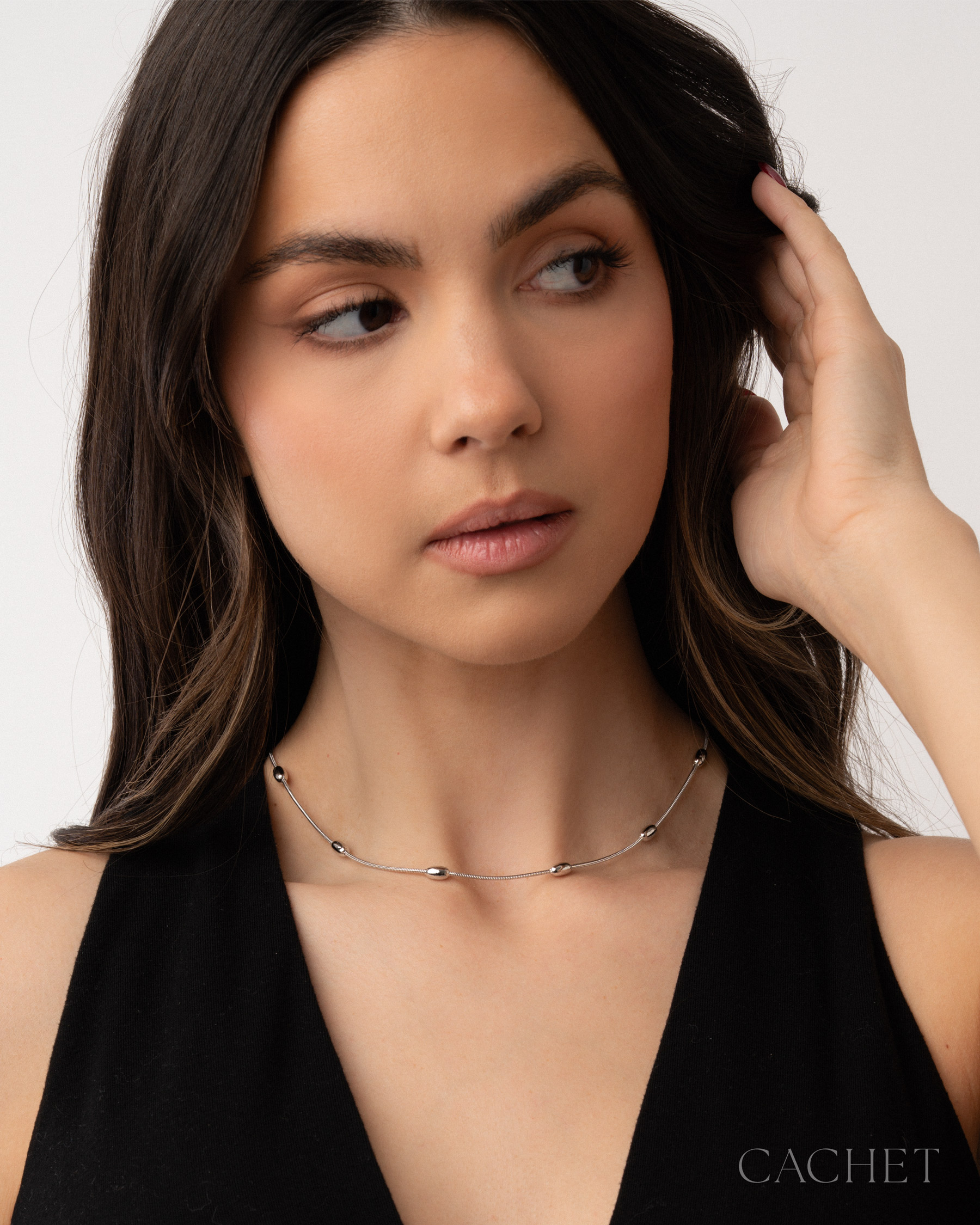 Rhodium Cachet jewelry worn by a model